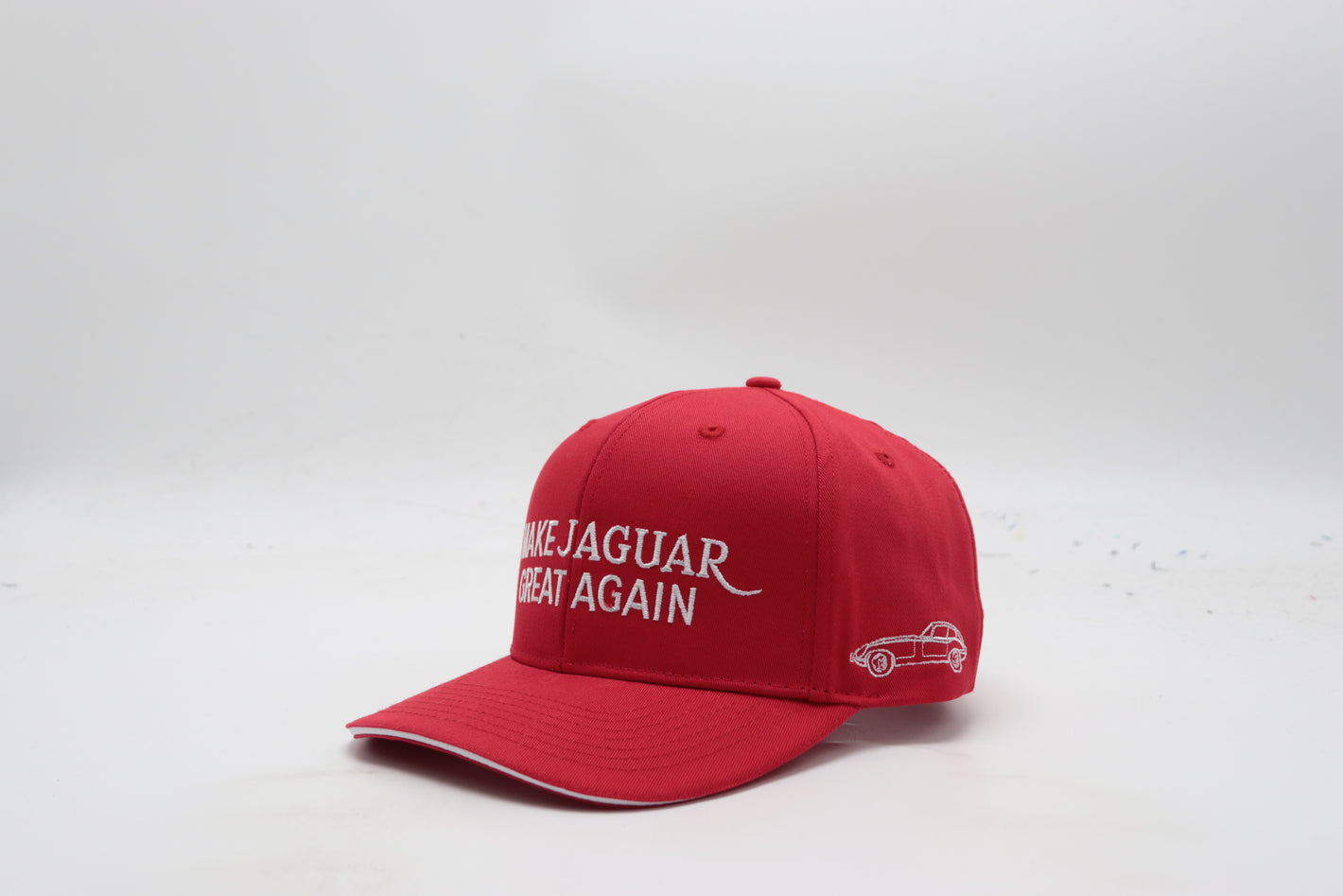 Red cap with text on a white background