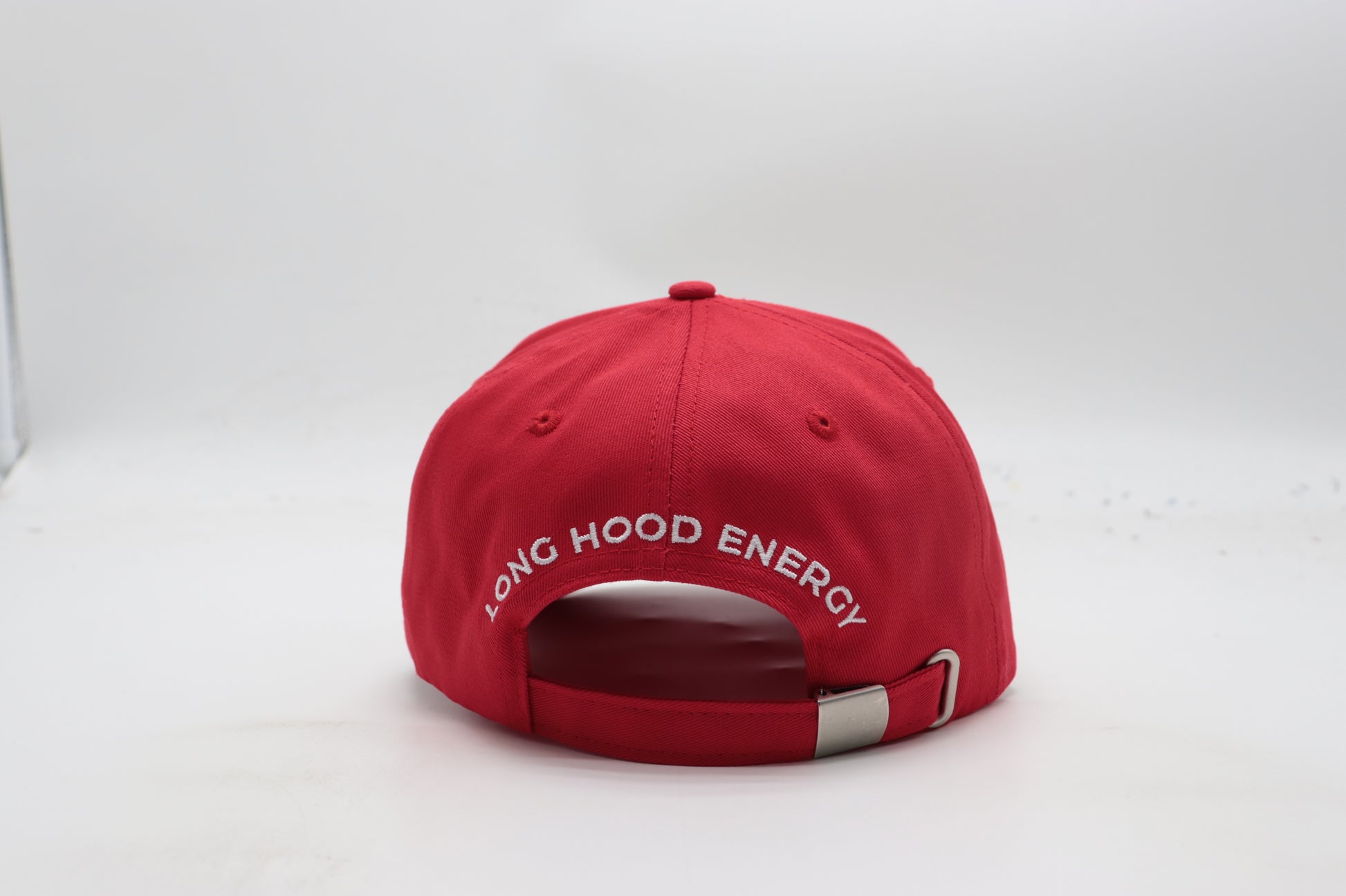 Red cap with 'Long Hood Energy' text on a white background