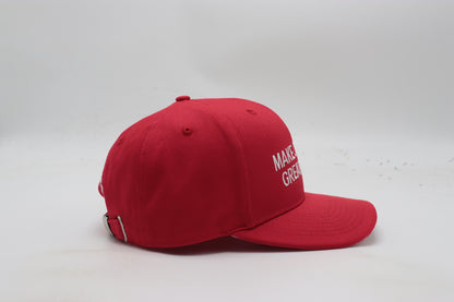 Red cap with 'Make America Great Again' text on a white background